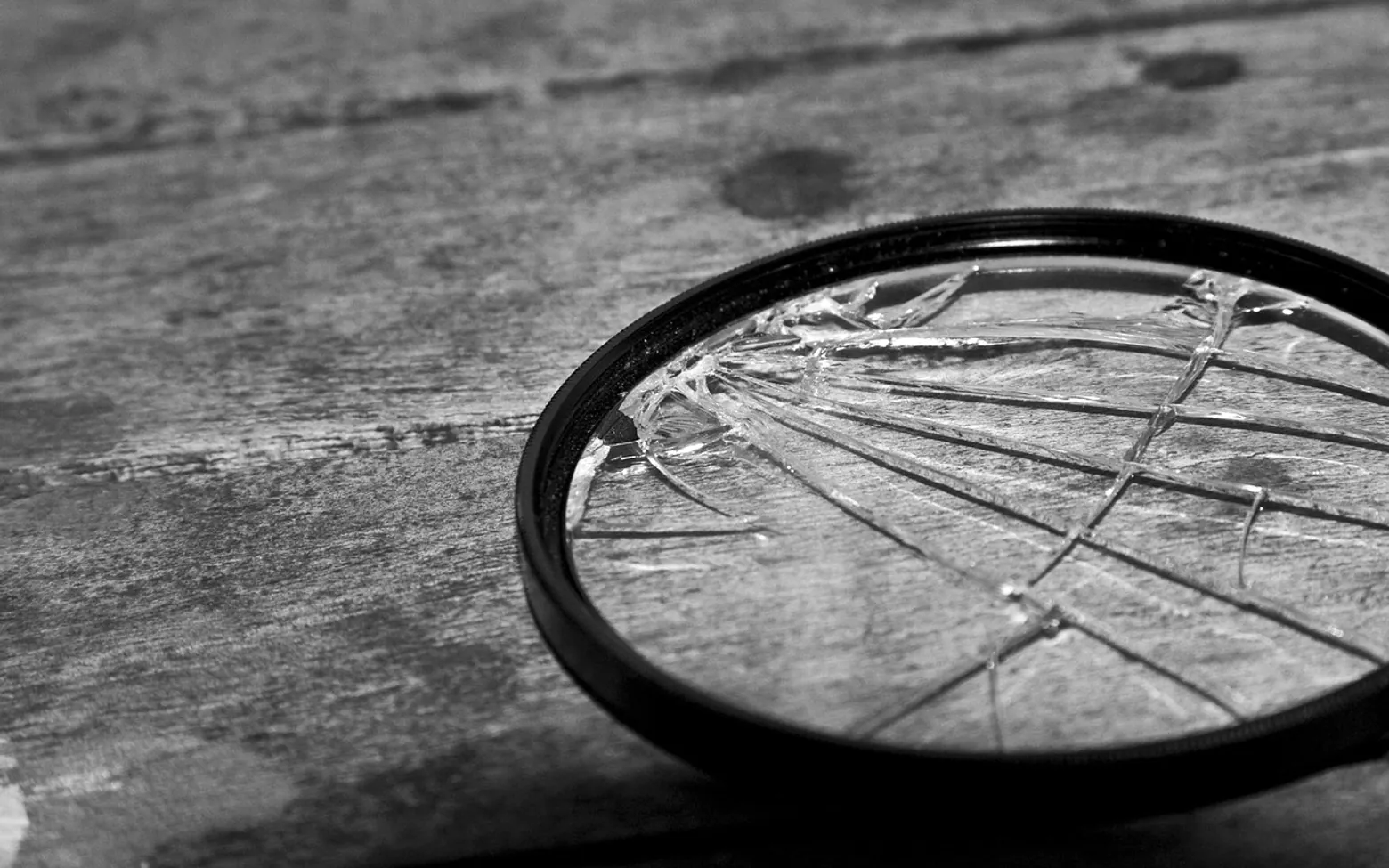Lens, broken and grey