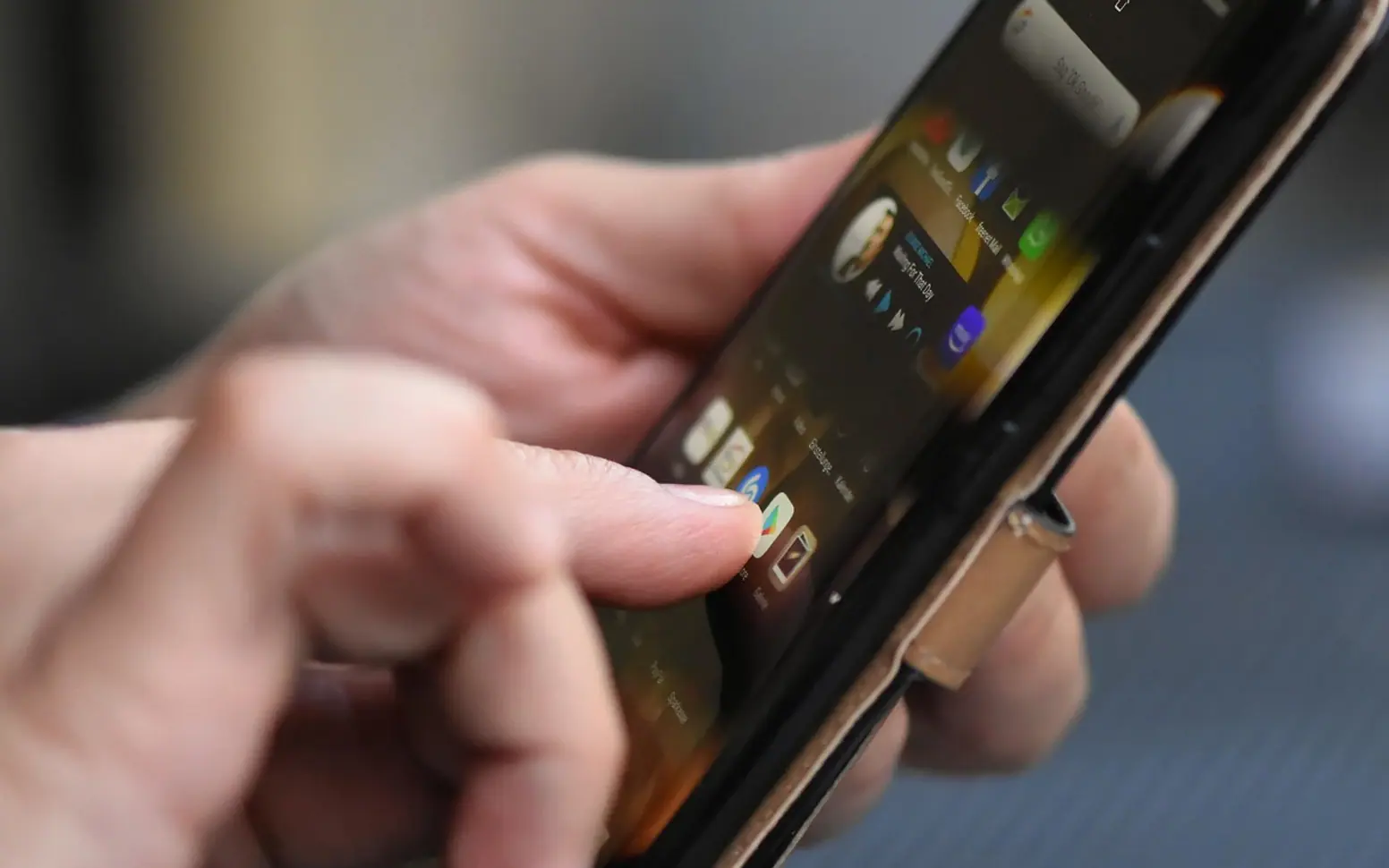 Smartphone, finger and tap