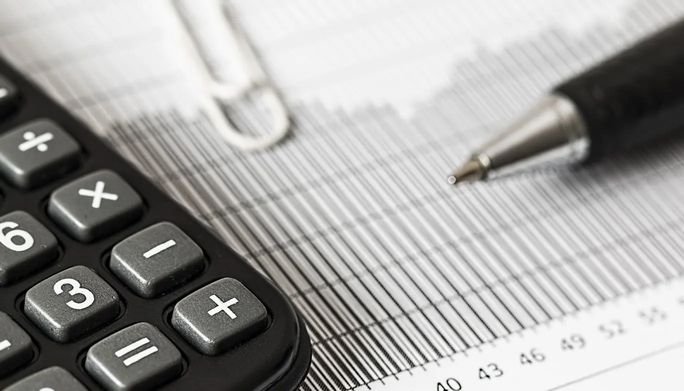 New year, calculator and calculation